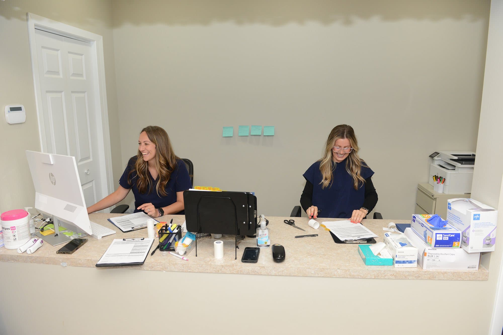 The Illiana Vascular Center front desk team ready to welcome patients